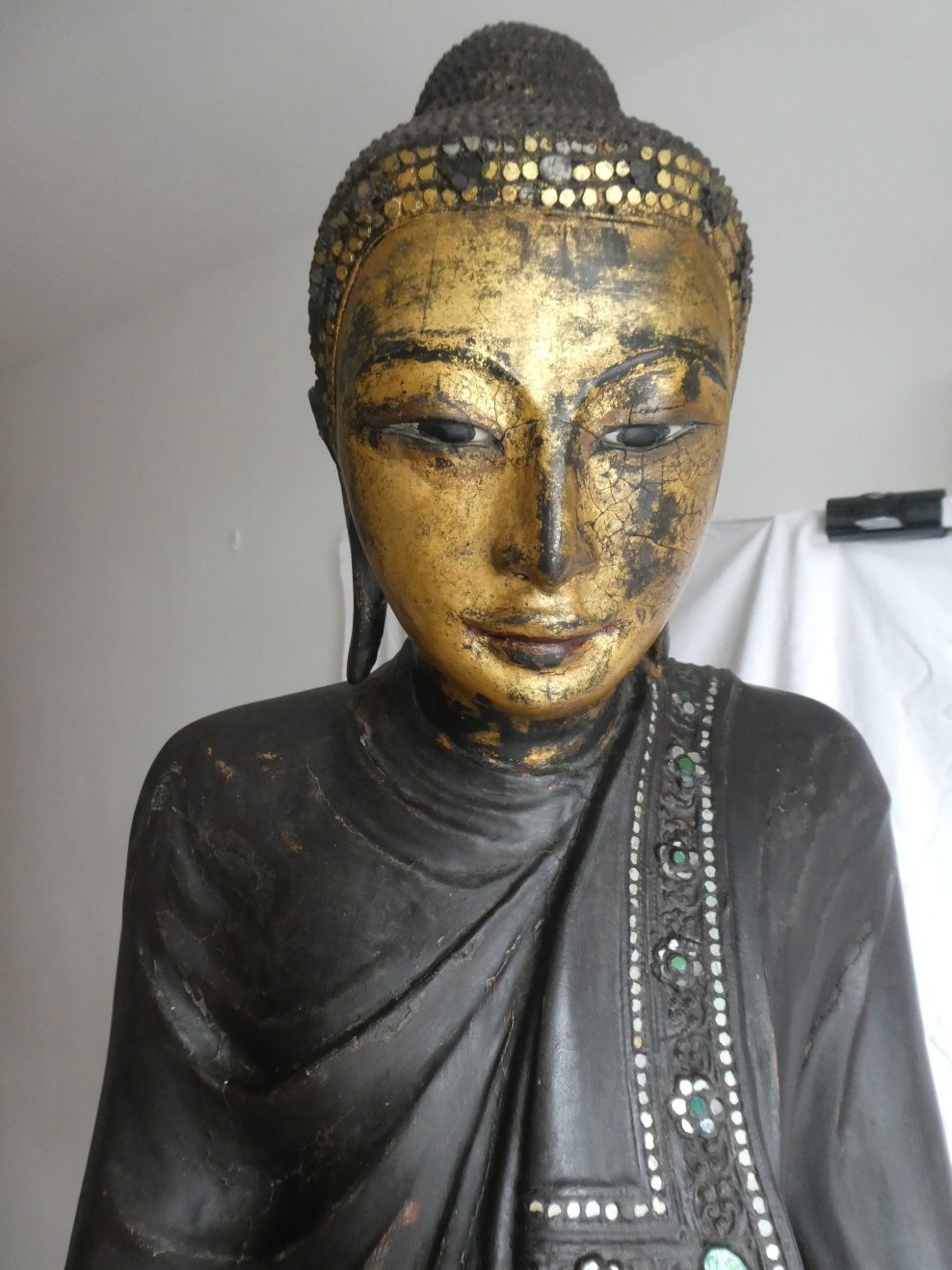Conservation of Burmese Buddha, 19th century wooden lacquer and polychrome sculpture
